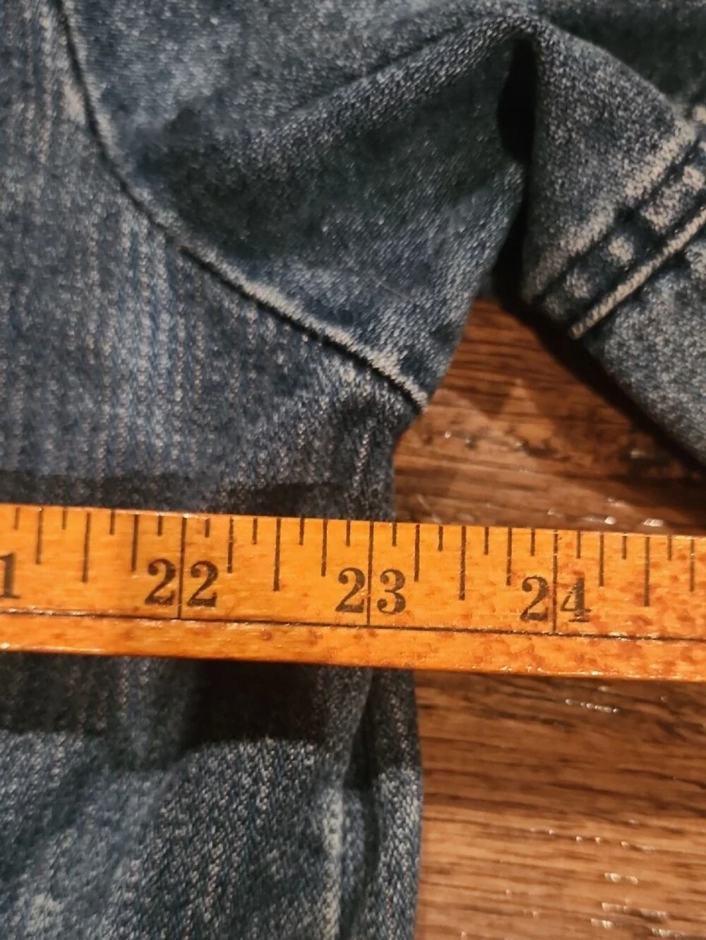 Vtg blue denim bomber jacket featuring a distinctive brown color